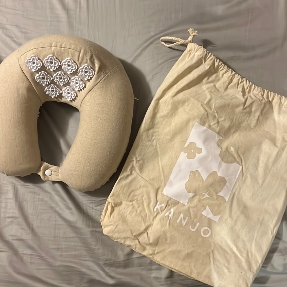 Kanjo acupressure travel neck pillow.